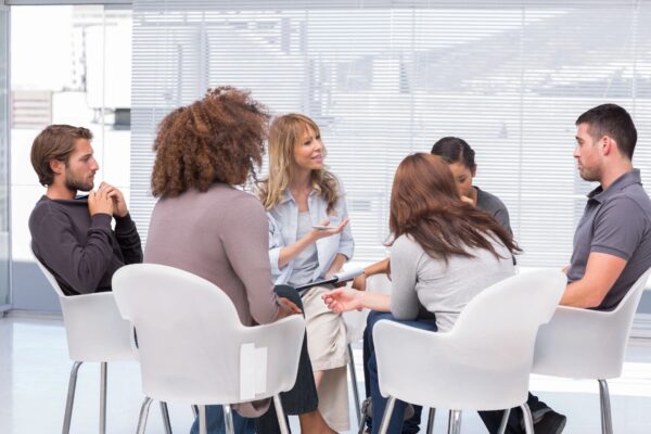 Six people in a counseling session